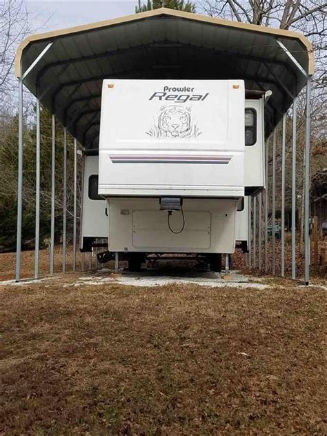Grass area tall and over grown. . Foxwood hills rv for sale